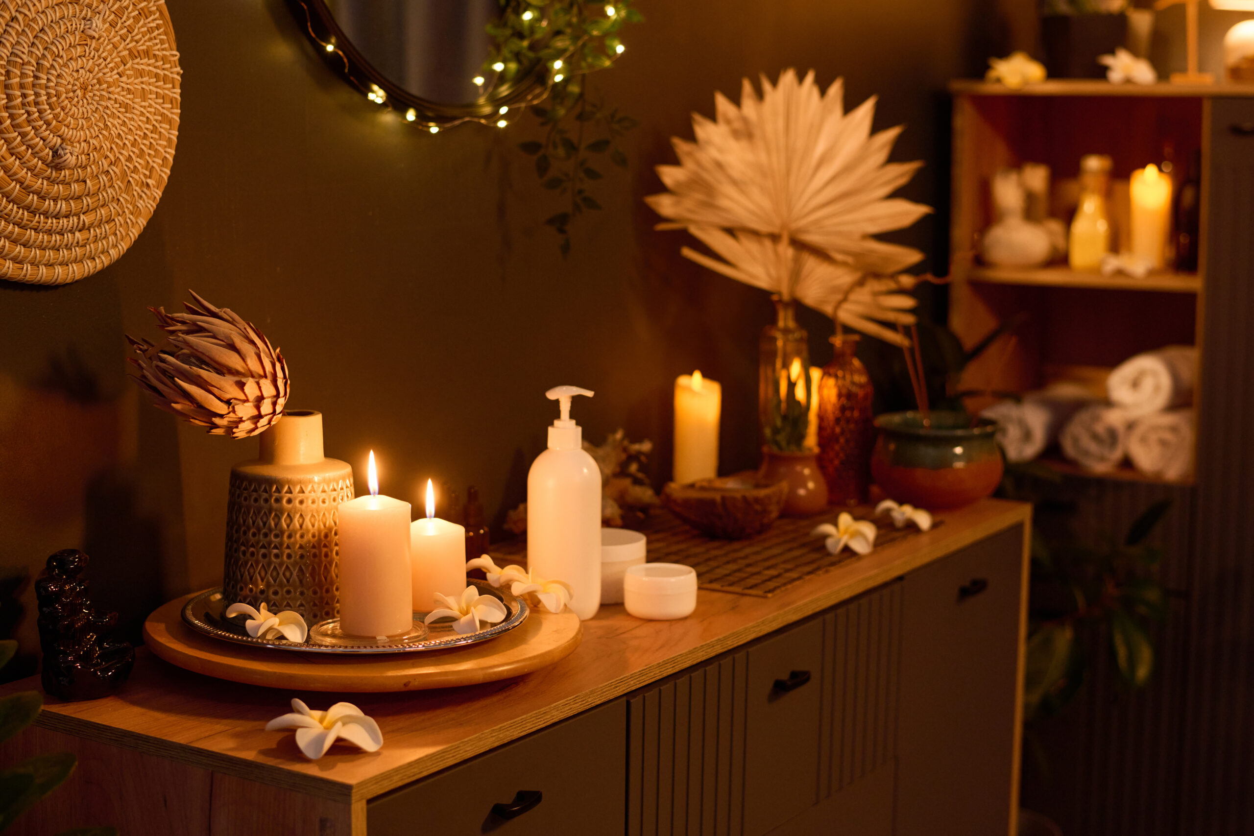 Dresser with Candles and Massage Oil on Top